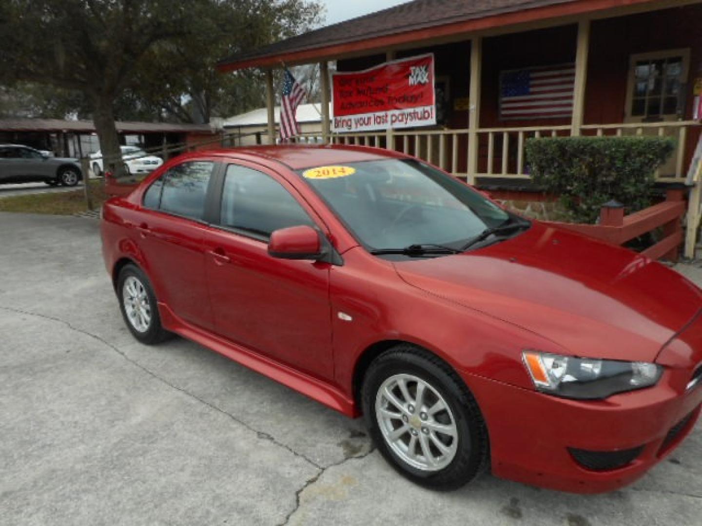 2014 RED MITSUBISHI LANCER (JA32U2FU2EU) , located at 390 Hansen Avenue, Orange Park, FL, 32065, (904) 276-7933, 30.130497, -81.787529 - Photo#2